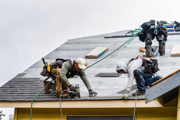 Professional Roofing technician working in Boston, MA